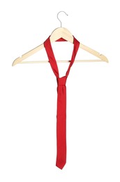 Hanger with red necktie isolated on white