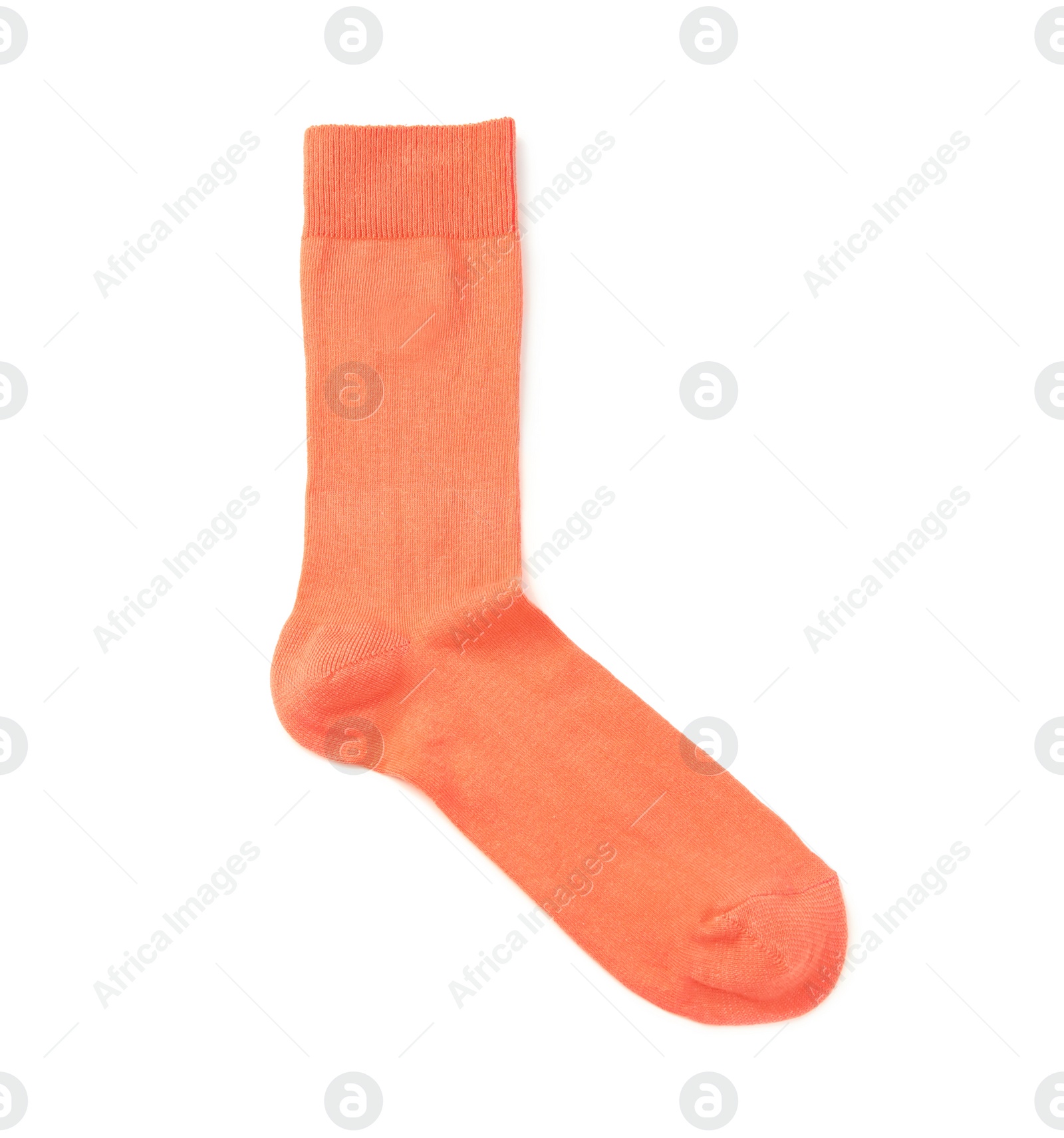 Photo of Orange sock on white background, top view