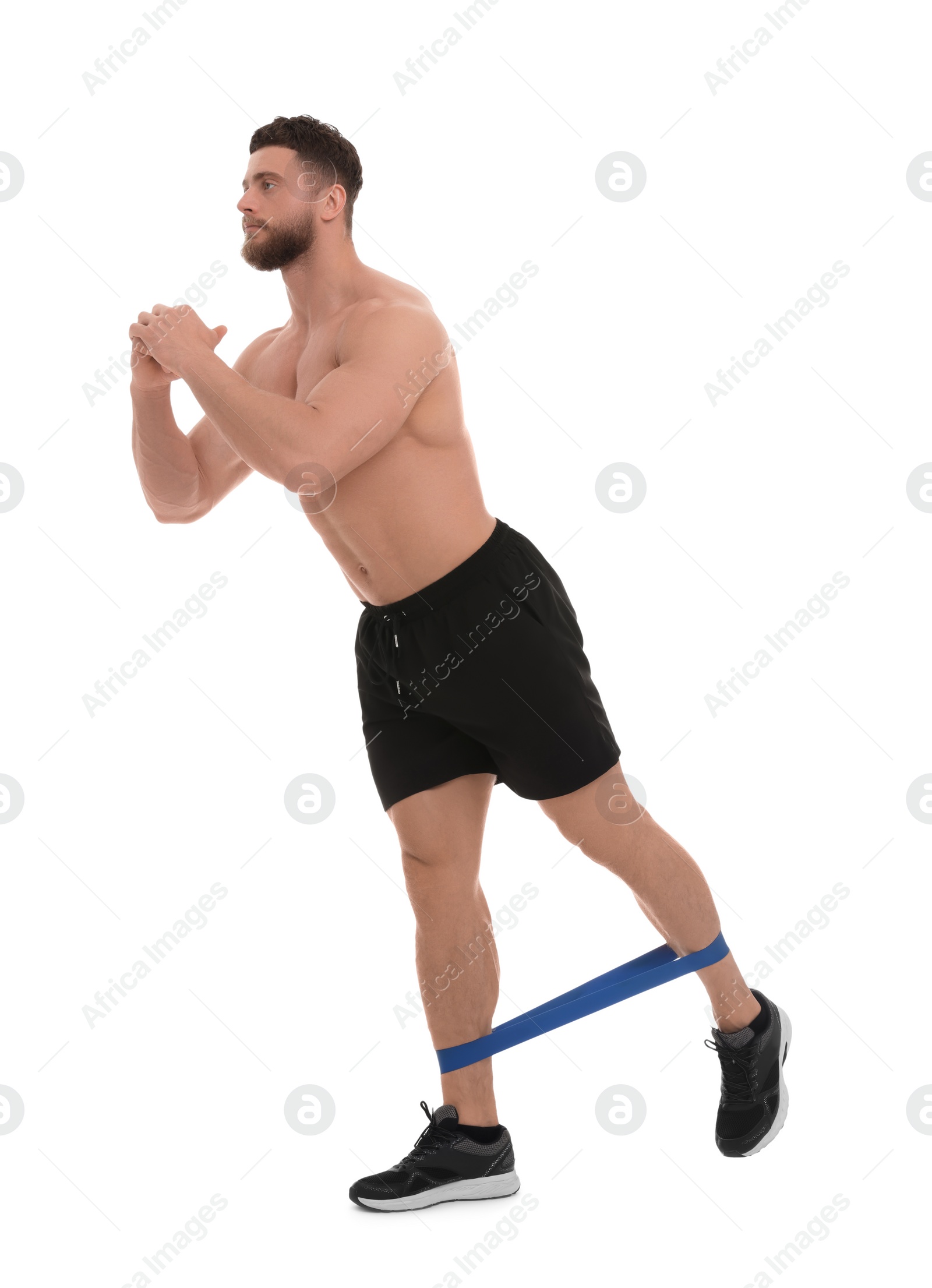 Photo of Young man exercising with elastic resistance band on white background