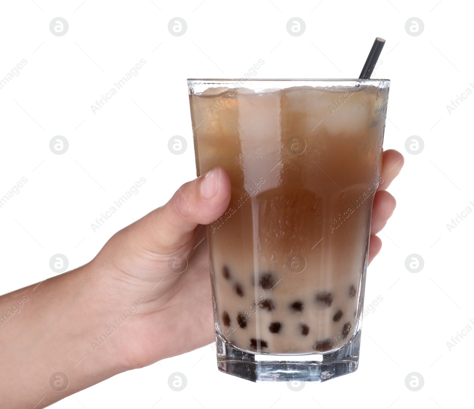 Photo of Woman holding tasty milk bubble tea on white background, closeup