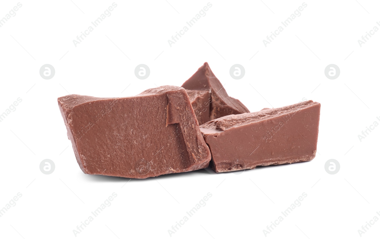 Photo of Pieces of tasty milk chocolate isolated on white