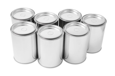 Many cans of paints on white background