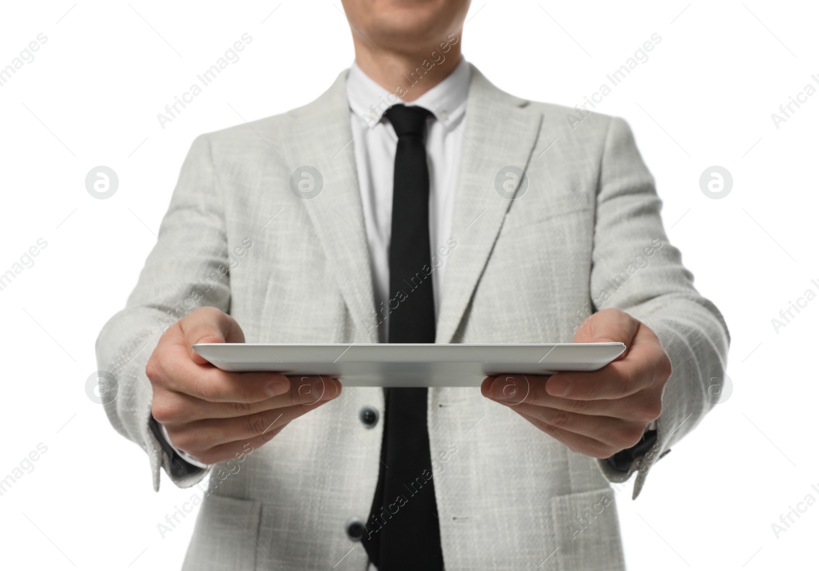 Photo of Businessman holding tablet computer on white background, closeup