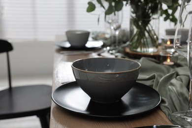 Photo of Festive table setting with beautiful tableware and decor indoors