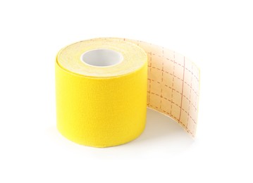 Photo of Yellow kinesio tape in roll on white background