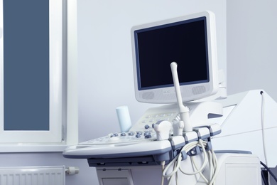 Photo of Modern ultrasound machine in office. Diagnostic technique