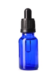 Cosmetic bottle of essential oil on white background