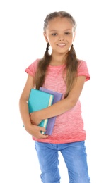 Photo of Little child with school supplies on white background