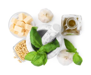Photo of Different ingredients for cooking tasty pesto sauce isolated on white, top view