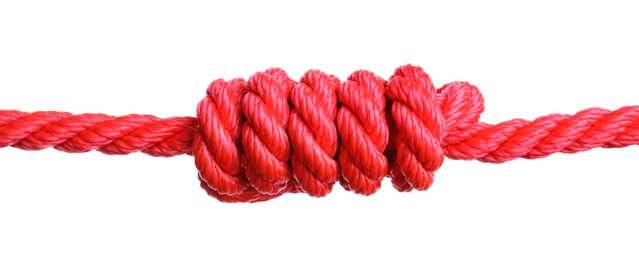 Photo of Red rope with knot on white background