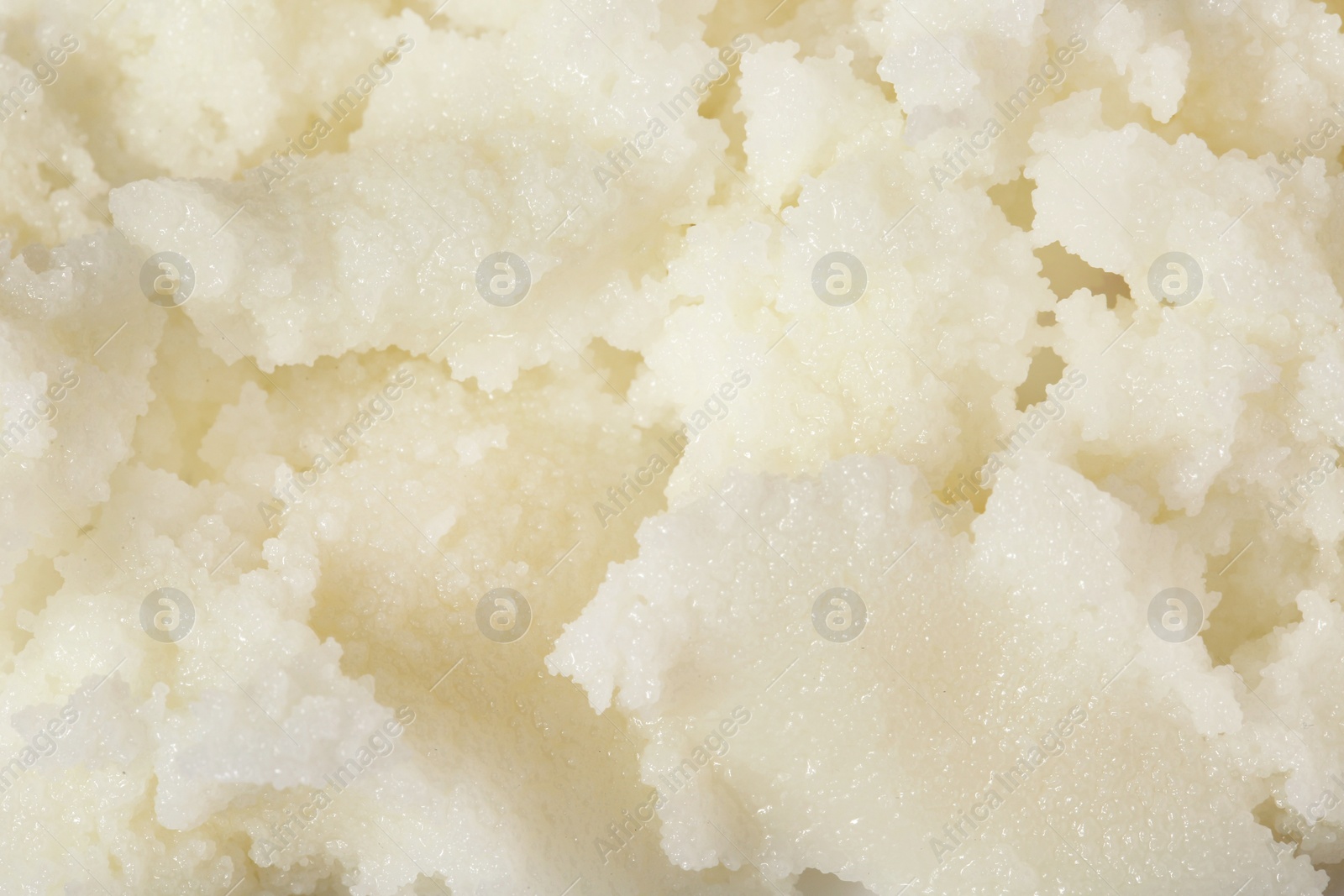 Photo of Fresh shea butter as background, top view. Cosmetic product