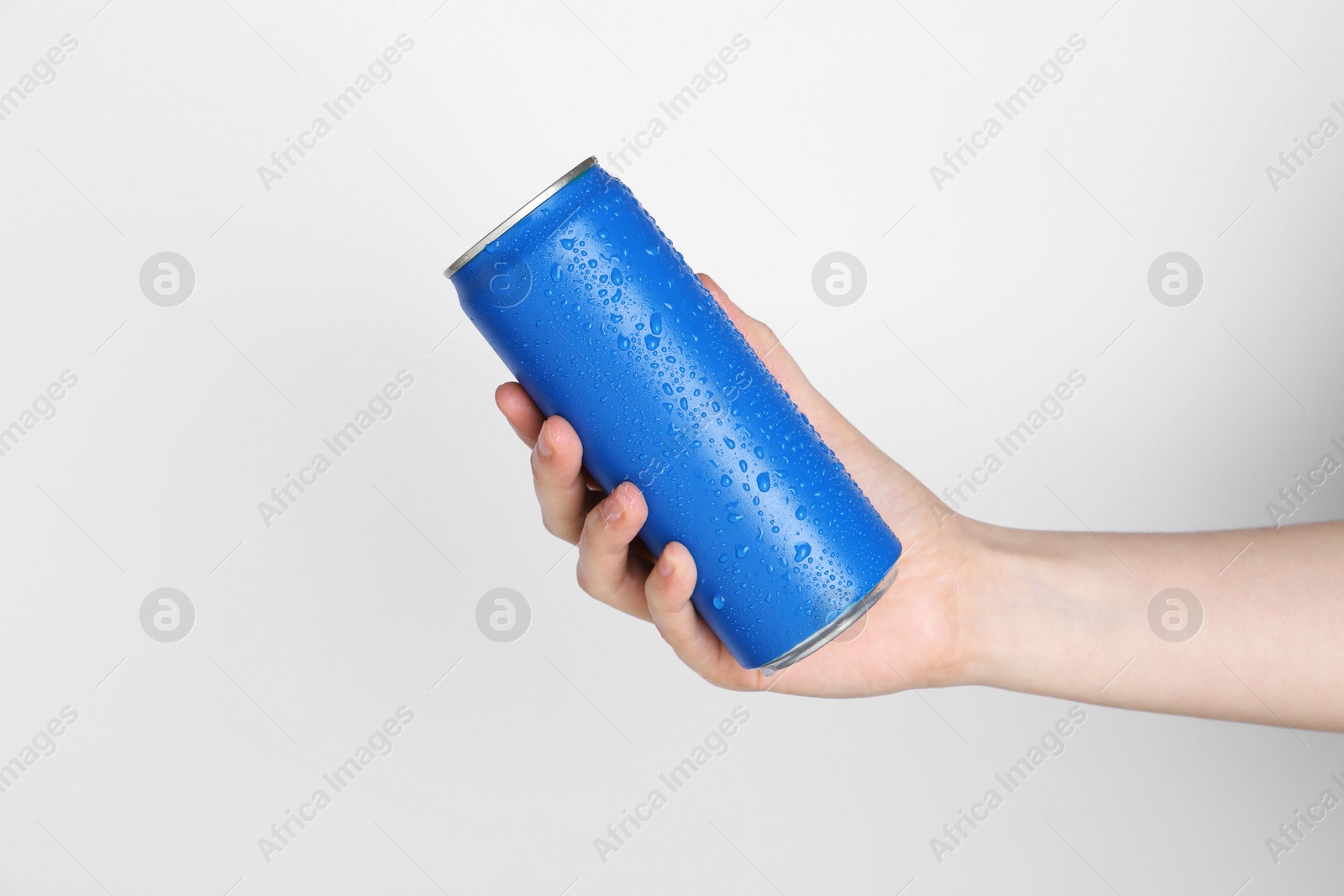 Photo of Woman with energy drink on light grey background, closeup