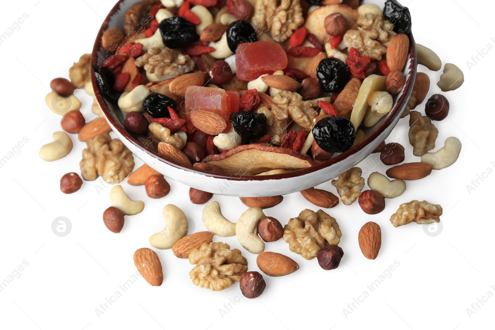 Photo of Bowl with mixed dried fruits and nuts on white background