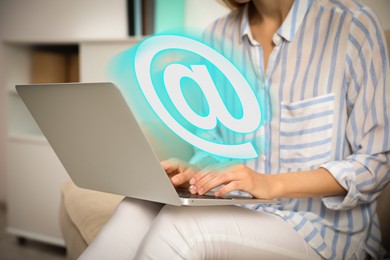 Image of At sign illustration and woman sending email via laptop indoors, closeup