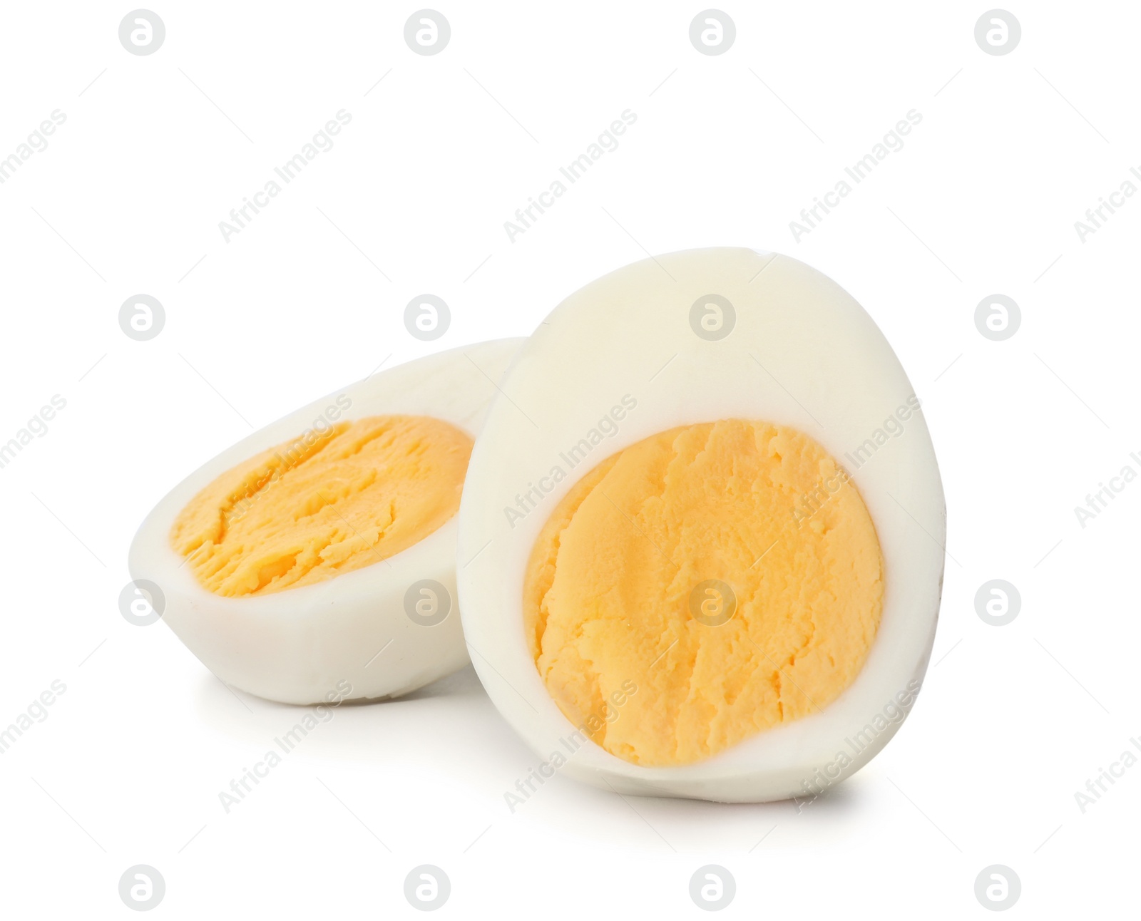 Photo of Sliced hard boiled egg on white background