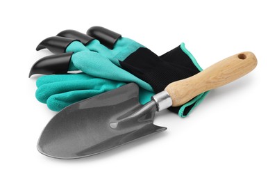 Photo of Claw gardening gloves and trowel isolated on white