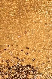 Photo of Fabric with beautiful shiny paillettes as background