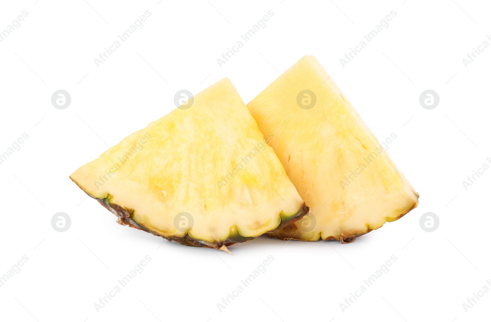 Photo of Slices of tasty ripe pineapple isolated on white