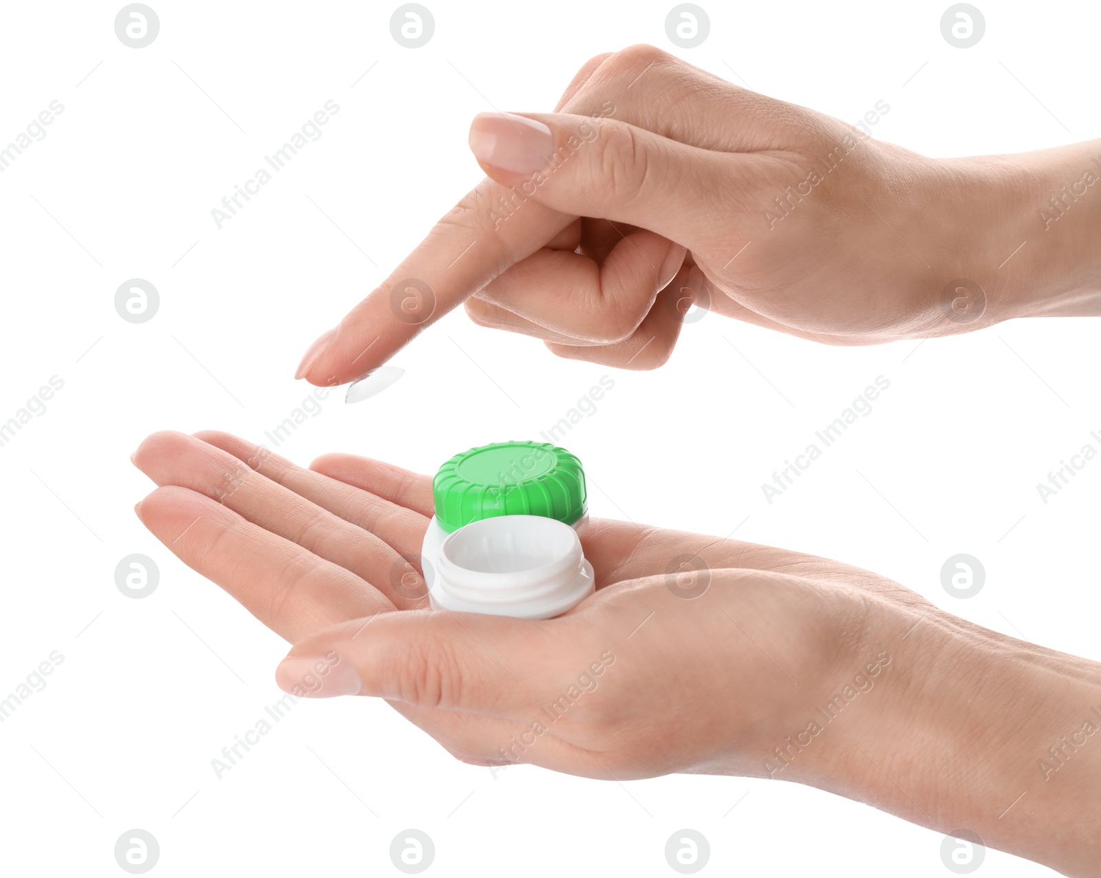 Photo of Woman holding case with contact lenses on white background, closeup