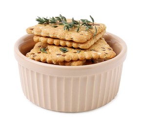 Photo of Cereal crackers with flax, sesame seeds and thyme in bowl isolated on white