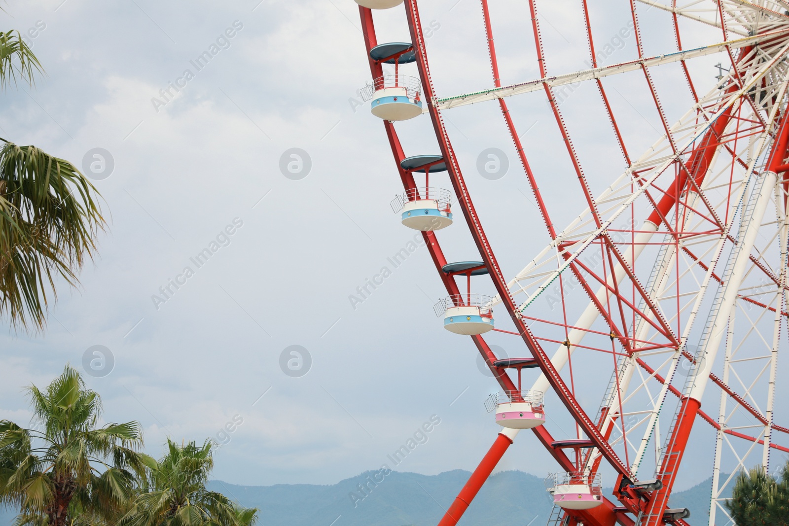 Photo of Beautiful large Ferris wheel outdoors, space for text