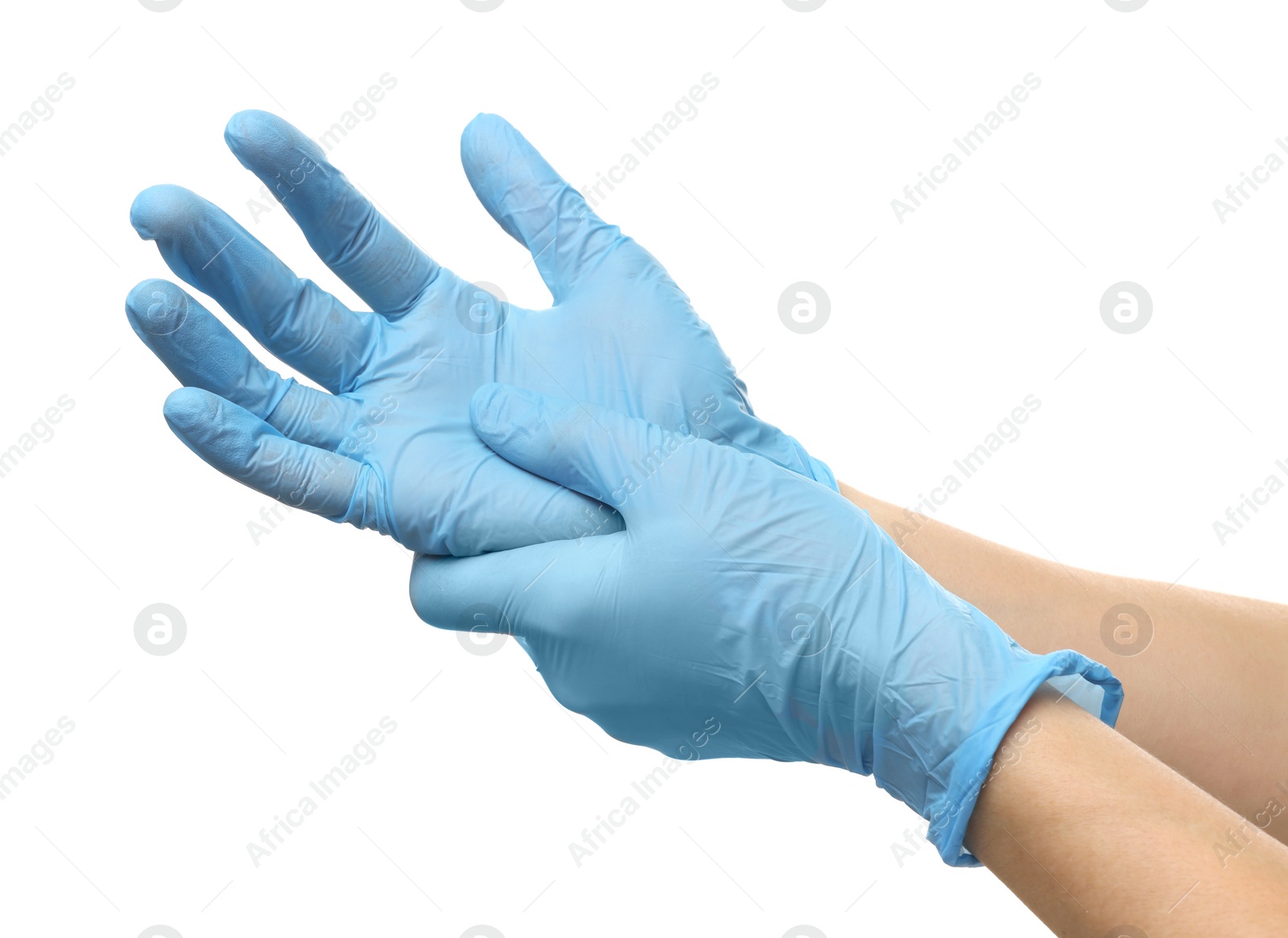 Photo of Doctor wearing light blue medical gloves on white background, closeup