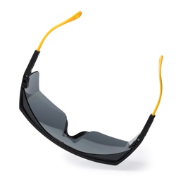 Photo of Protective goggles on white background. Construction tool