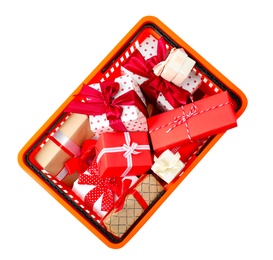 Photo of Shopping basket full of gift boxes on white background, top view