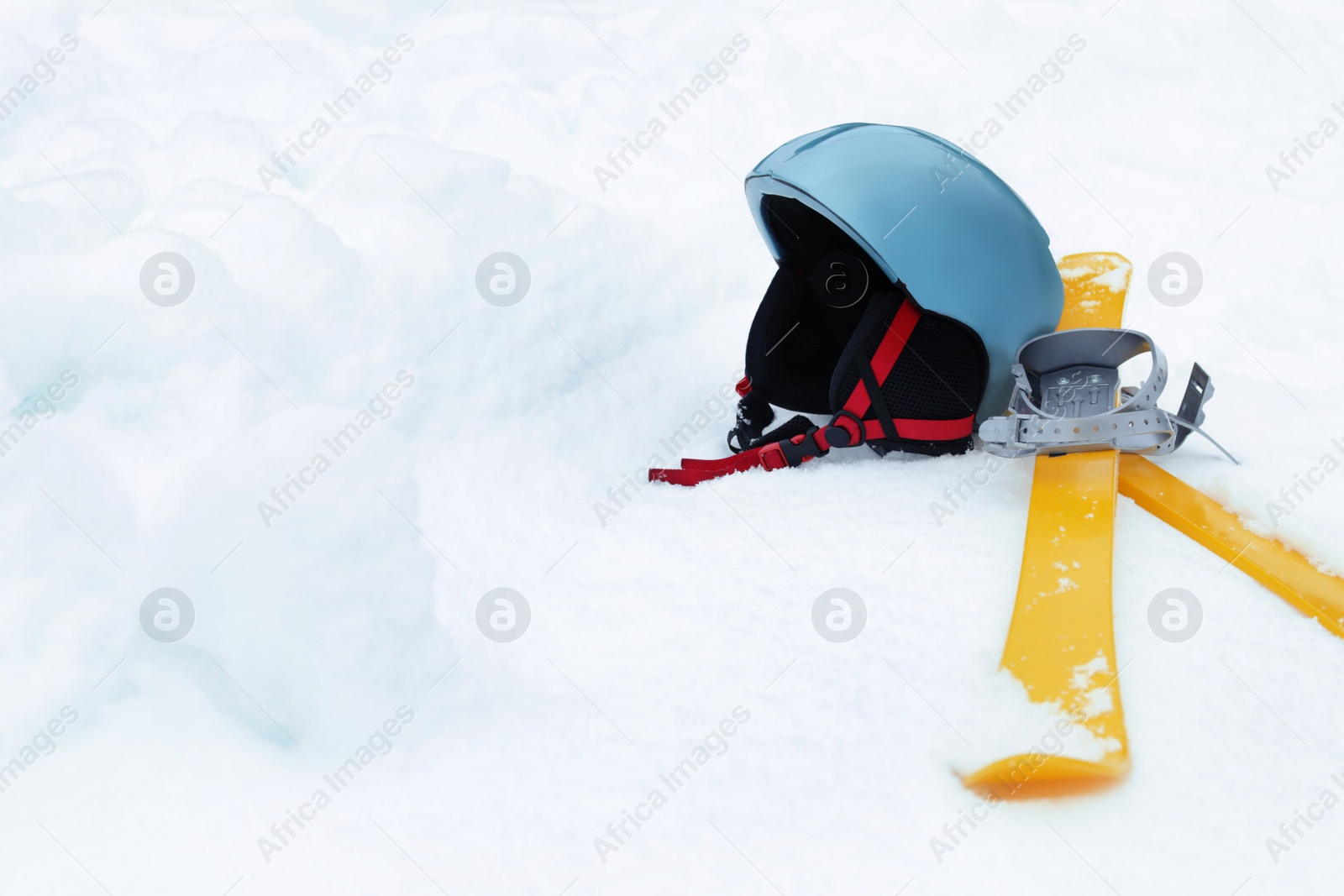 Photo of Ski equipment on snow, space for text. Winter vacation