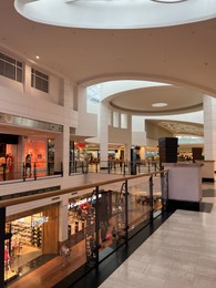 Photo of Warsaw, Poland - July 26, 2022: Big shopping mall with many fashion stores inside