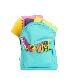 Turquoise backpack with different school supplies isolated on white