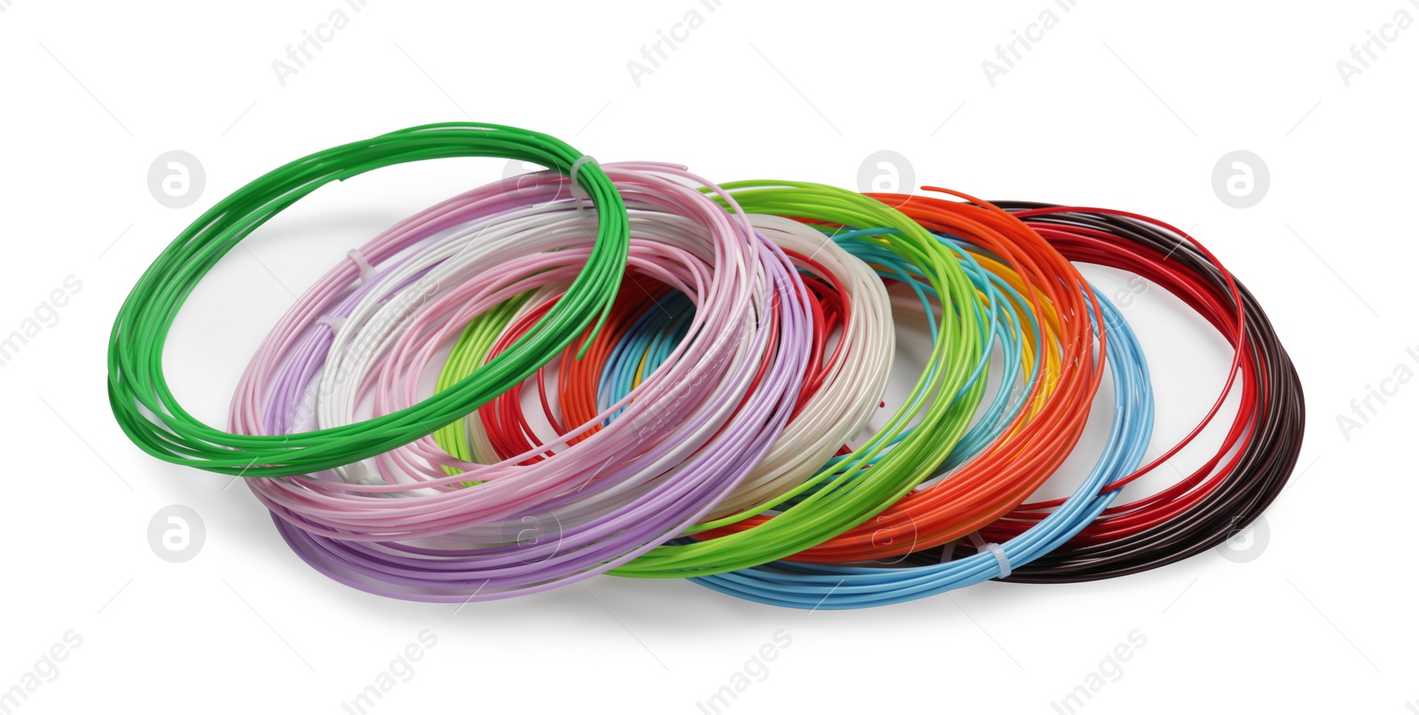 Photo of Colorful plastic filaments for 3D pen isolated on white