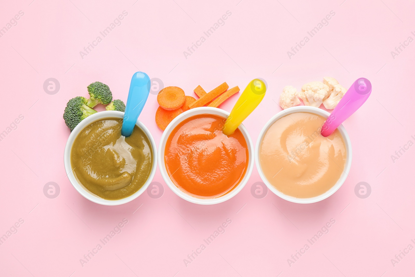 Photo of Healthy baby food and ingredients on pink background, flat lay