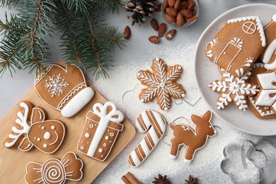 Photo of Flat lay composition with delicious homemade Christmas cookies on grey table