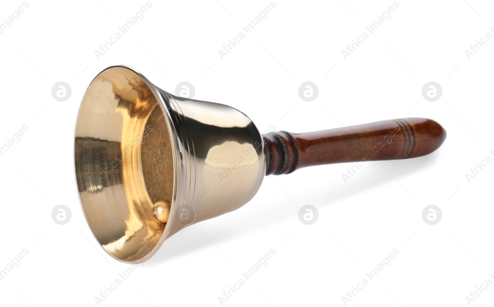 Photo of Golden school bell with wooden handle isolated on white