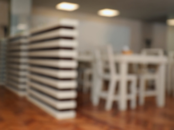 Photo of Blurred view of modern school canteen with new furniture