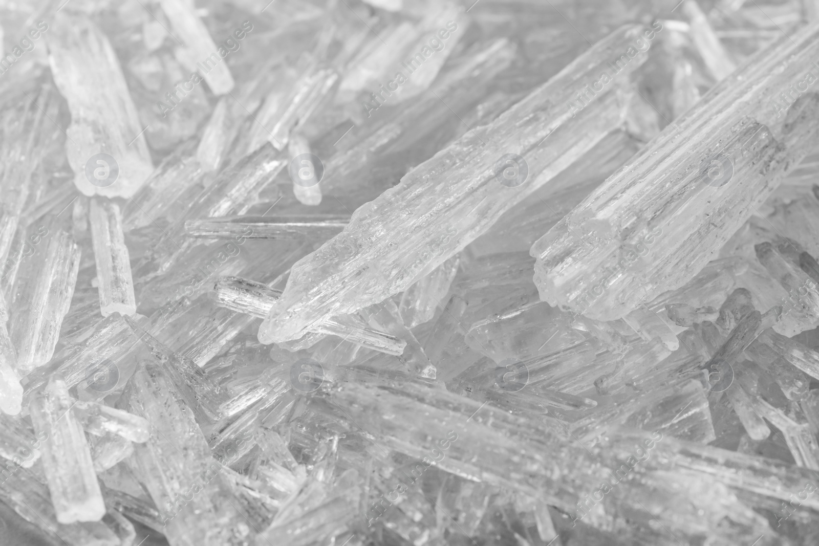 Photo of Heap of menthol crystals as background, top view