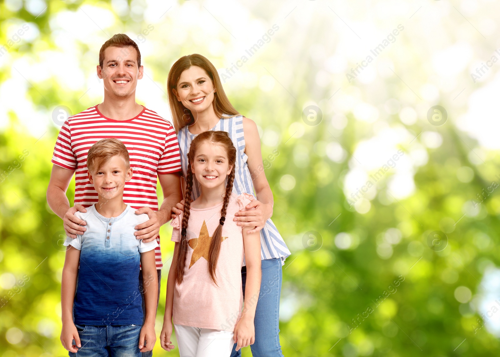 Image of Happy family with children outdoors on sunny day, space for text