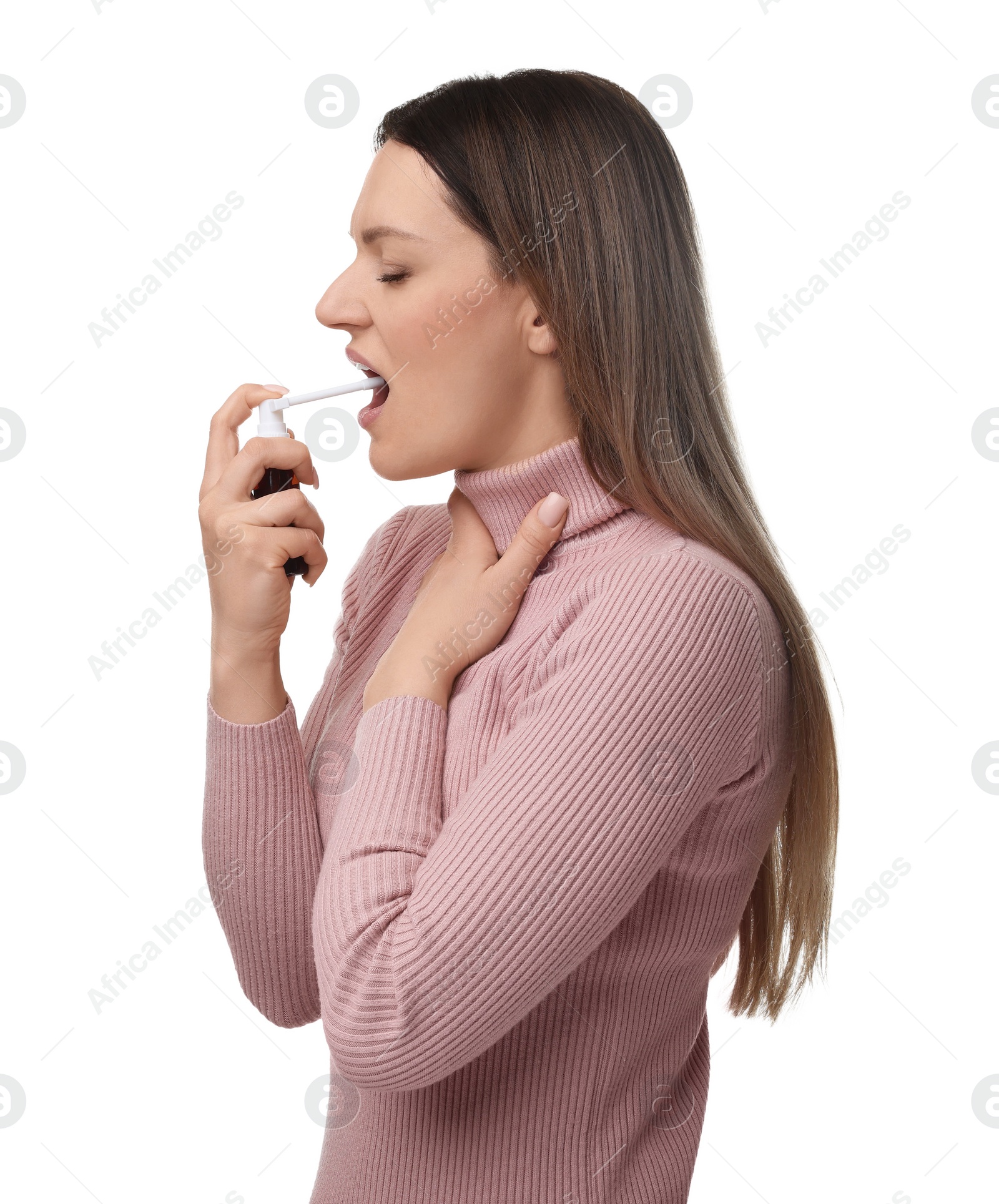 Photo of Woman using throat spray on white background