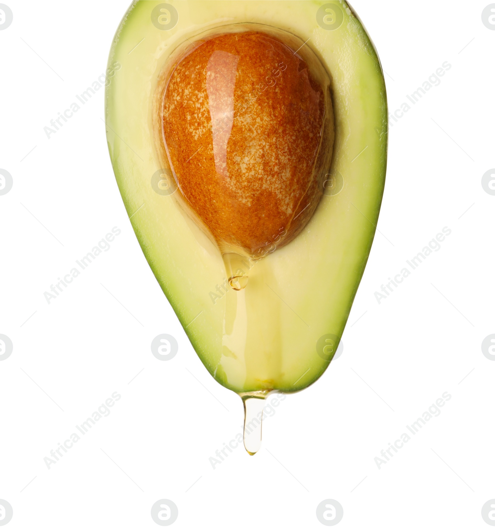 Photo of Fresh cut avocado with dripping cooking oil on white background