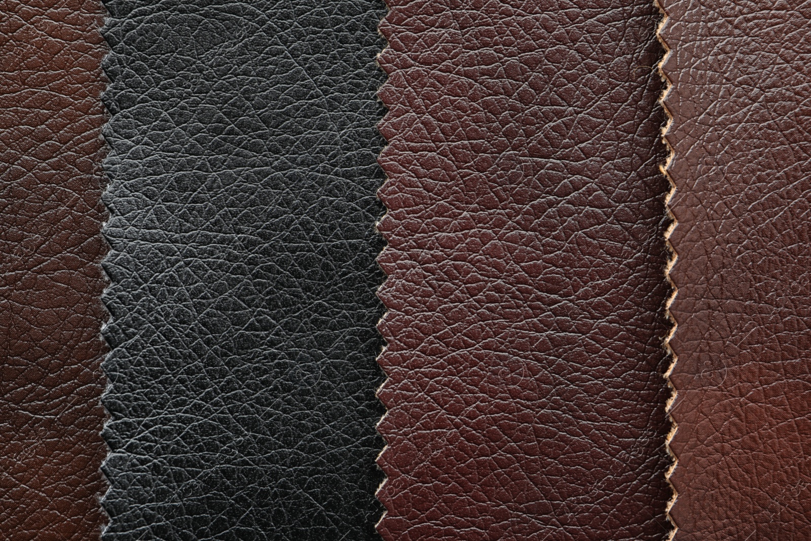 Photo of Leather samples of different colors for design as background, closeup