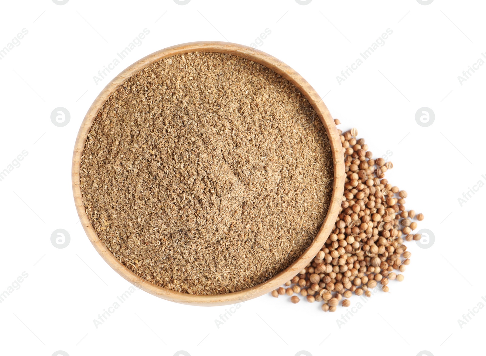 Photo of Wooden bowl with powdered coriander and corns on white background, top view