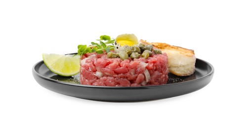 Photo of Tasty beef steak tartare served with quail egg, toasted bread and other accompaniments isolated on white