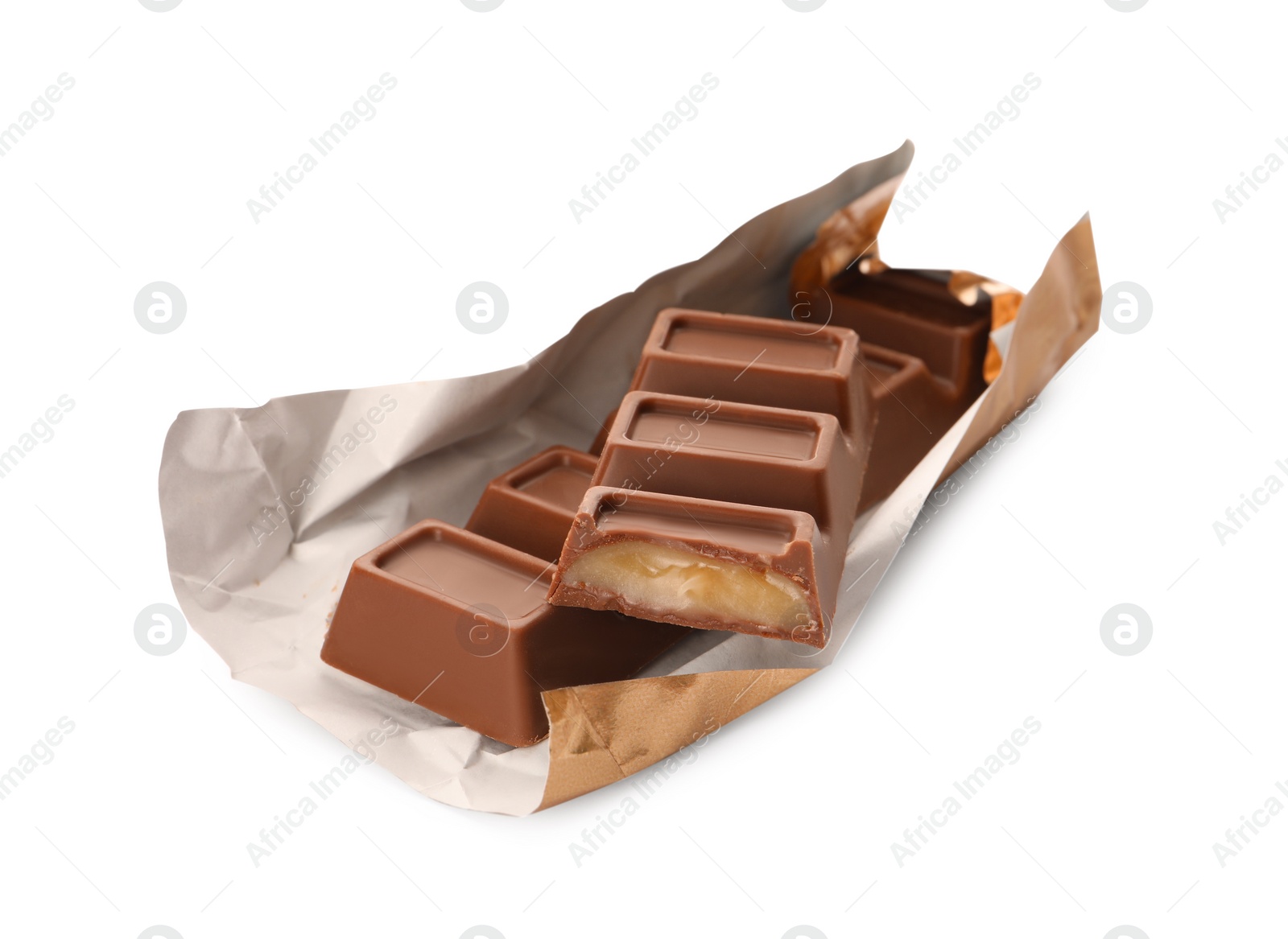 Photo of Paper wrap with delicious chocolate bars on white background