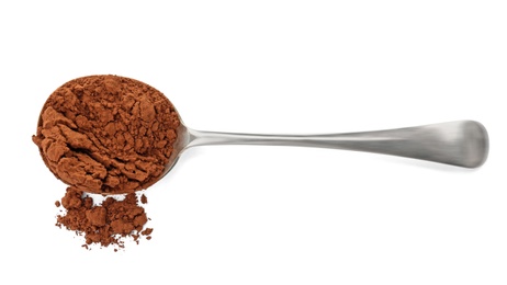 Spoon with cocoa powder on white background