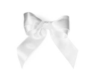 Photo of Satin ribbon tied in bow on white background, top view