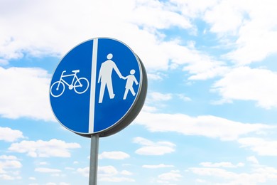 Photo of Road sign Shared Lane Bicycles and Pedestrians on spring day