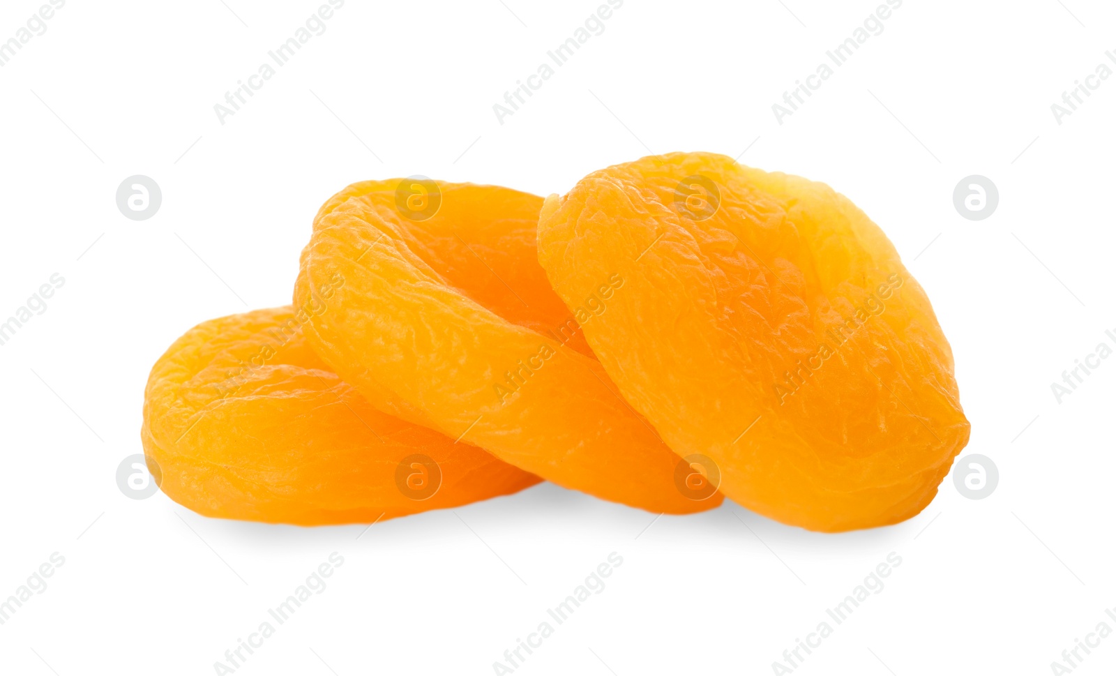 Photo of Tasty apricots on white background. Dried fruits