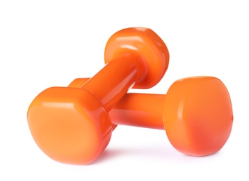 Photo of Color dumbbells on white background. Home fitness