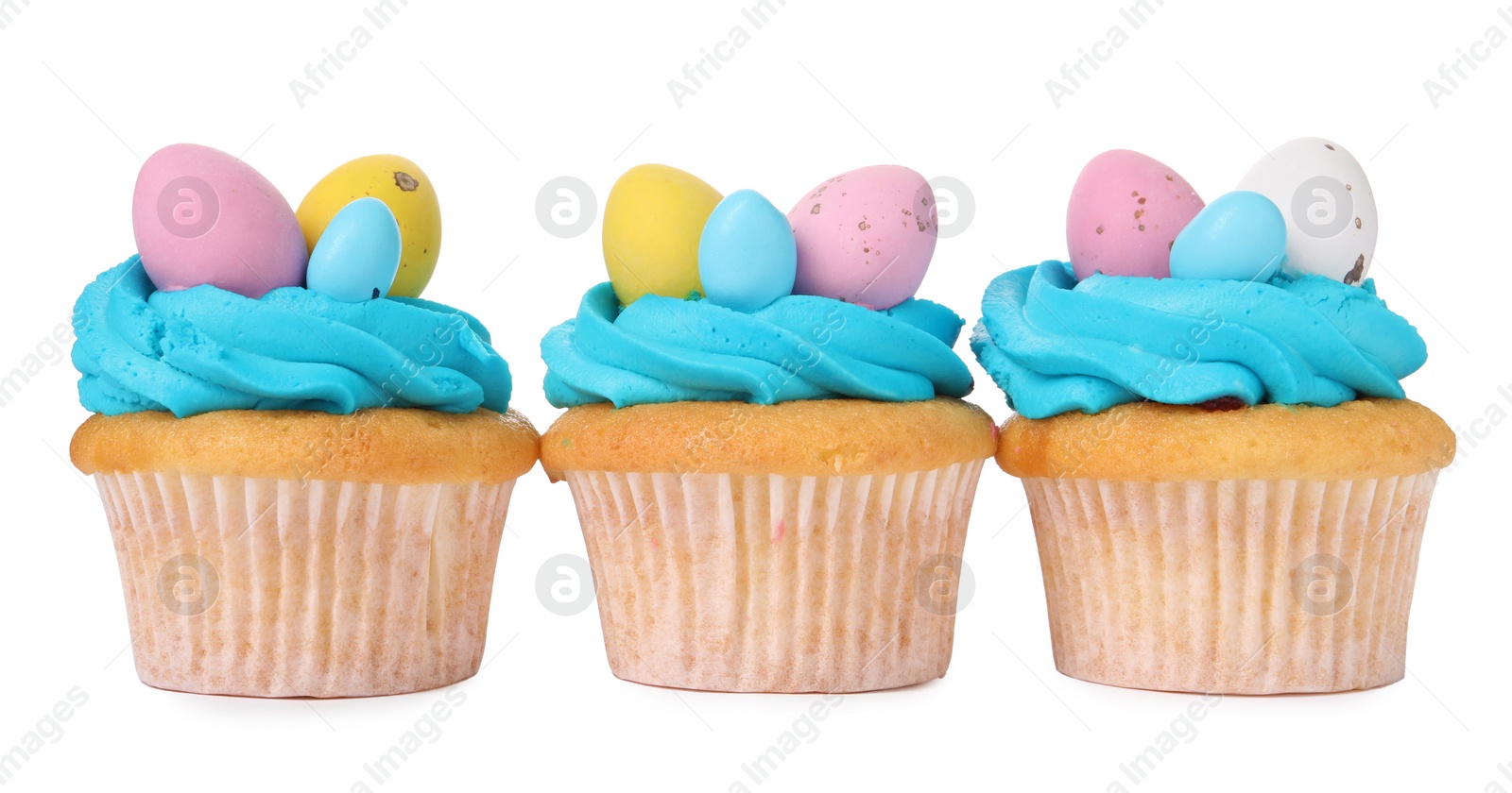 Photo of Tasty decorated Easter cupcakes isolated on white